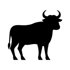 Black silhouette of a standing bull with large horns