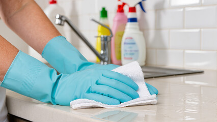hand of a woman cleaning the kitchen