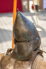 Obraz premium old medieval bascinet-type helmet popular in medieval Europe, evolving from a simple steel cap in the late 13th century