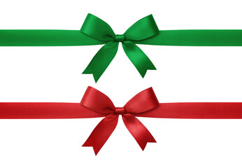 Two satin ribbons, one green and one red, tied into elegant bows on a white background.
