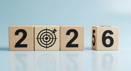 Wooden blocks spelling 2026 with a target symbol numbers
