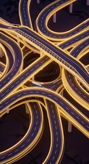 Intricate aerial view of a modern highway interchange at night with glowing light trails from vehicles.