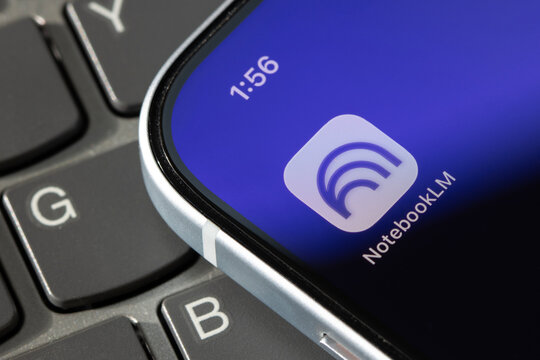 Portland, OR, USA - Nov 20, 2025: Google NotebookLM app icon is seen on the screen of an iPhone. NotebookLM is an AI-powered research assistant developed by Google Labs.