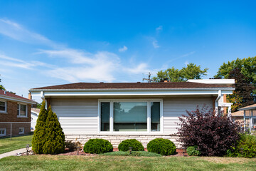 Residence architecture. Suburban neighborhood. Suburban house architecture. Private house. Neighborhood architecture. Property in neighborhood. Residential property house. House insurance