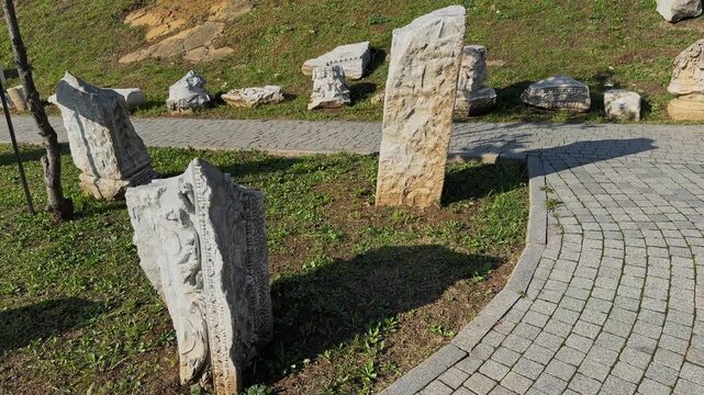 4K video of Prusias ad Hypium theater in Duzce. The ancient Roman ruins are nestled directly within the modern settlement of Konuralp, blending history with urban life.