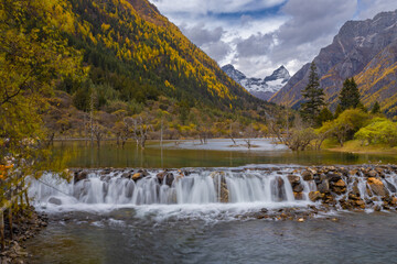 Siguniang Mountains (Four Girls Mountain) is a famous tourist attraction in Sichuan, China, It features mountains, pine forest streams and wild animals and has been certified as a 5A level 
