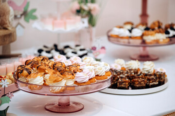 Candy bar of different cookies, candy and sweets at party