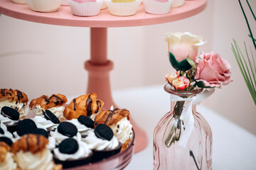 Candy bar of different cookies, candy and sweets at party