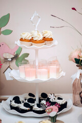 Candy bar of different cookies, candy and sweets at party