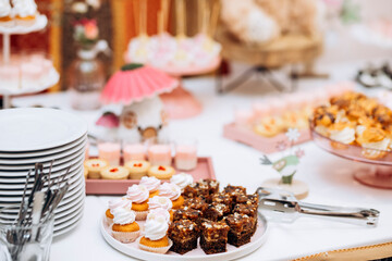 Candy bar of different cookies, candy and sweets at party