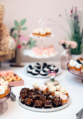 Candy bar of different cookies, candy and sweets at party