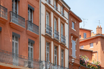 Obraz premium Views of Toulouse, city in southern France, Haute-Garonne department, Occitania region, centre of European aerospace industry with pink red bricks houses, travel destination