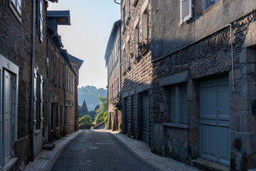 Walking in Uzerche, historical fortified royal patronage medieval town in Correse department, Nouvelle-Aquitaine, France, old houses and narrow streets