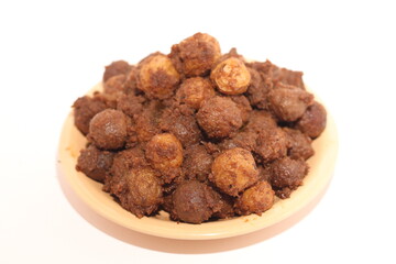 Potato rendang served on a plate, Rendang is a typical Padang food. With a white background