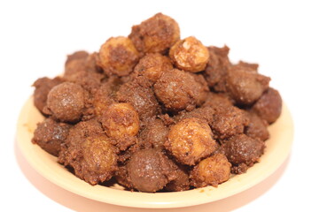 Potato rendang served on a plate, Rendang is a typical Padang food. With a white background