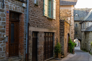 Walking in Uzerche, historical fortified royal patronage medieval town in Correse department, Nouvelle-Aquitaine, France, old houses and narrow streets