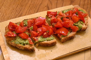 Starter in italian restaurants, bread bruschetta roasted homebaked bread with olive oil and chopped...