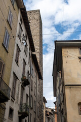 Tourists destination, historical part of Bergamo city, Bergamo Alta with narrow streets, churces, old houses, located on hill with fortress walls, Lombardy, Northern Italy