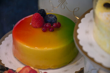 Italian sweet dessert dolce pastry and cakes with cream and fruits on display in artisanal bakery in Milan, Italy, close up