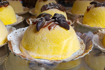 Sweet dessert Polenta e Osei di Bergamo Alta, most renowned sweet specialty of Bergamo’s cuisine, made from sponge cake, chocolate, butter, hazelnut creams, rum