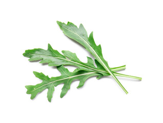 Fresh arugula leaves on white background