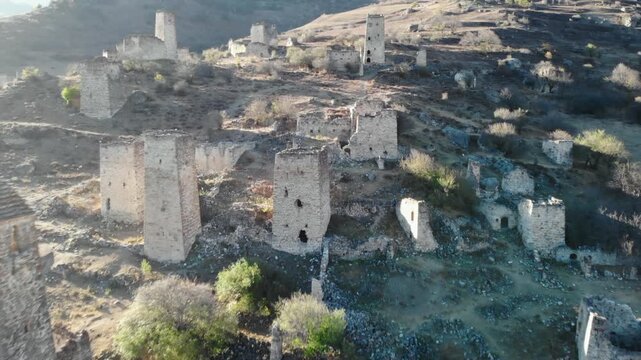 Ancient stone towers of a ruined mountain village. Media