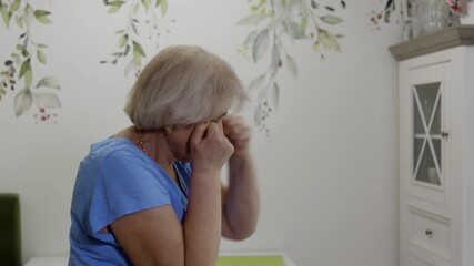 Senior woman steadily punching, showcasing strong physical fitness and wellness commitment during retirement years, embodying vibrant and energetic approach to aging