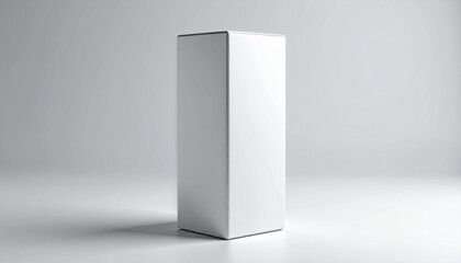 Tall white rectangular box standing upright on light gray background with smooth surface and sharp edges.