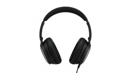 A pair of black over ear headphones with a cable on a black background in a studio setting