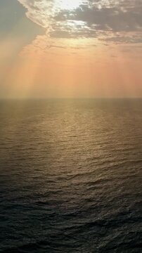 Aerial view of Mandvi Beach in Kutch, Gujarat, India, captured in stunning 4K resolution. Beautiful drone footage showcasing the long golden shoreline, calm blue waves, clean sandy beach, and peaceful