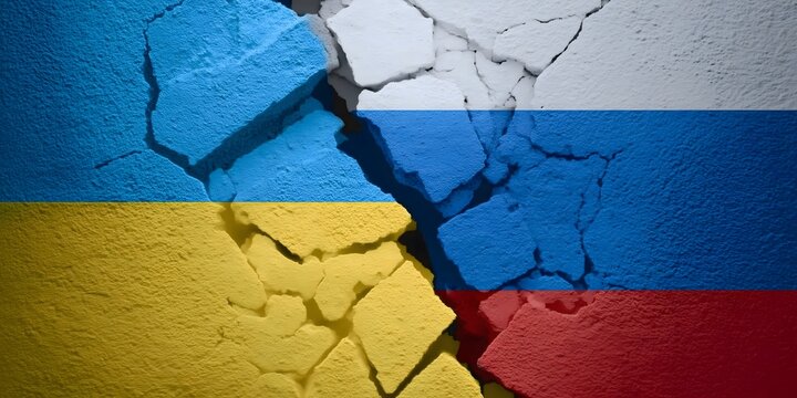 Ukraine and russia flags cracking showing conflict