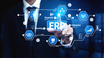 A businessman engages with a digital interface representing ERP (Enterprise Resource Planning), highlighting various business functions and technology integration. Tessel