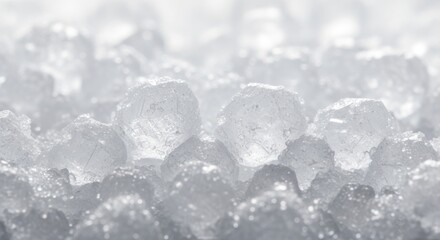 Close-up view of a pile of ice cubes, showing their crystalline structure and transparency.