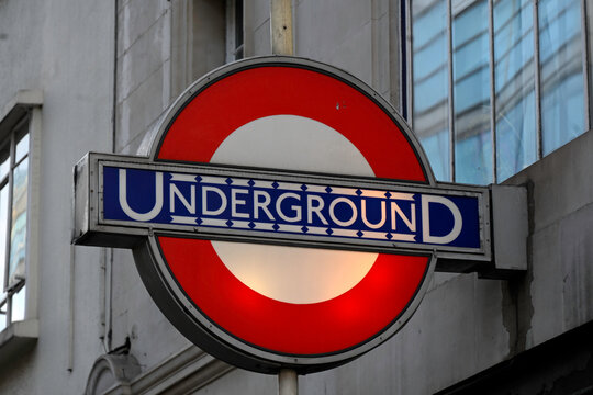 LONDON, UK - NOVEMBER 18, 2025:  Lit sign of vintage London Underground logo
