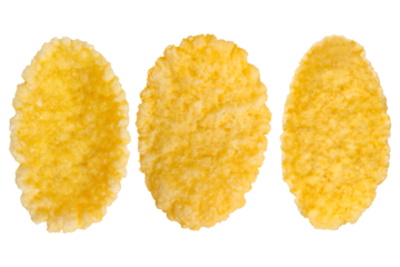 Three golden cornflakes isolated on a transparent background.