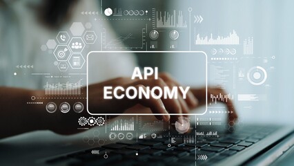 Hands Typing on Keyboard with Overlay of Digital Graphics Representing API Economy and Data Analytics Concepts. Asymptotic smart data analytic.