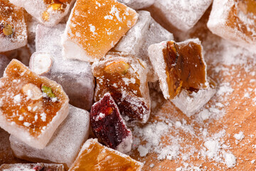 Sweet food Turkish delight, assorted rahat locum in form of cubes with nuts and powdered sugar, traditional food