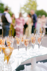 glasses with food on the table