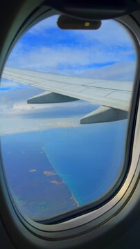 View of blue clouds during a plane flight.
Beautiful view from a flying airplane.
Airplane travel.
Passenger air transport