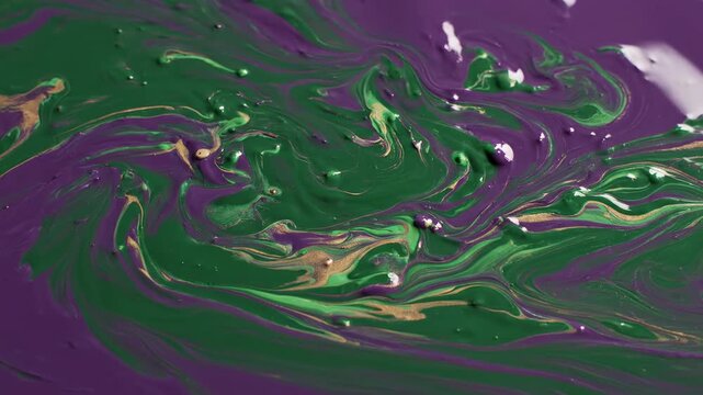 Organic fluid ripples creating a deep purple and emerald green abstract looping background texture creative, art, wave pattern
