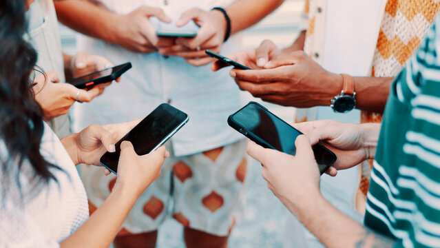 Outdoor, circle or hands of people with phone screen, friends exchange numbers or typing for data sync. Networking, sharing info or group with mobile app to search for connection, social media or web