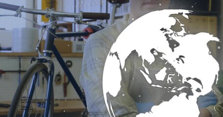 Bike mechanic adjusting apron as globe entering right obscuring then revealing face showcasing shop - Powered by Adobe