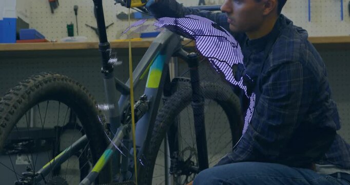 Kneeling bike tech pulling yellow tape, measuring frame fit while purple globe forming around bike