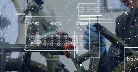 HUD popping in repair shop over bike while male tech adjusting seatpost and checking metrics