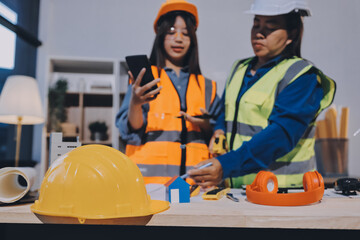 Architects and engineers working collaboratively on construction project