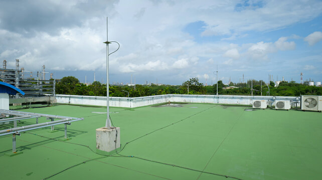 Copper grounding rod and lightning arrester installed at the highest point of a building