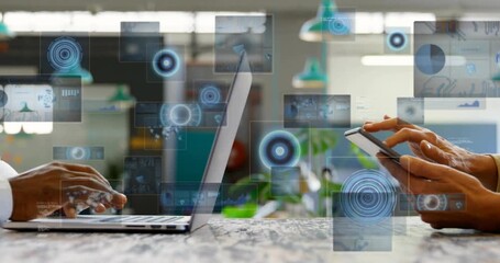 Two users typing on laptop and tapping phone, starting holo panels forming layered UI showing data - Powered by Adobe