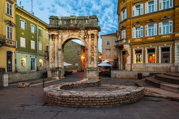 The Arch of the Sergii, Ancient Roman triumphal arch located in Pula, Istria, Croatia in morning...