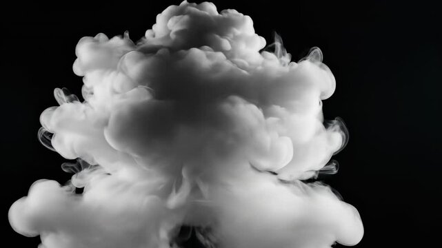 Ultra slow motion footage of dense white smoke billowing and dissolving against a completely solid black studio backdrop creating undefined abstract cloud shapes billowing, dissolving, macro