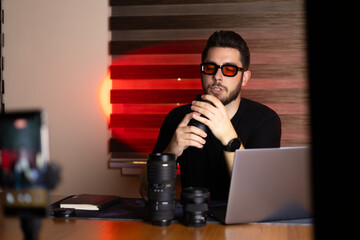 Blogger is recording a video for their blog with camera